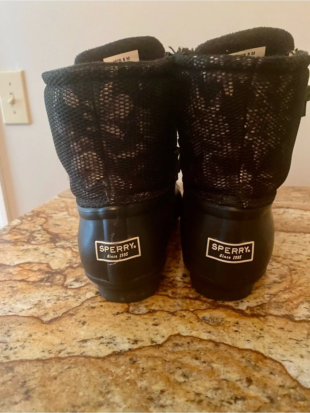 Women’s Sperry Black Waterproof Duck Boots with dressy flair